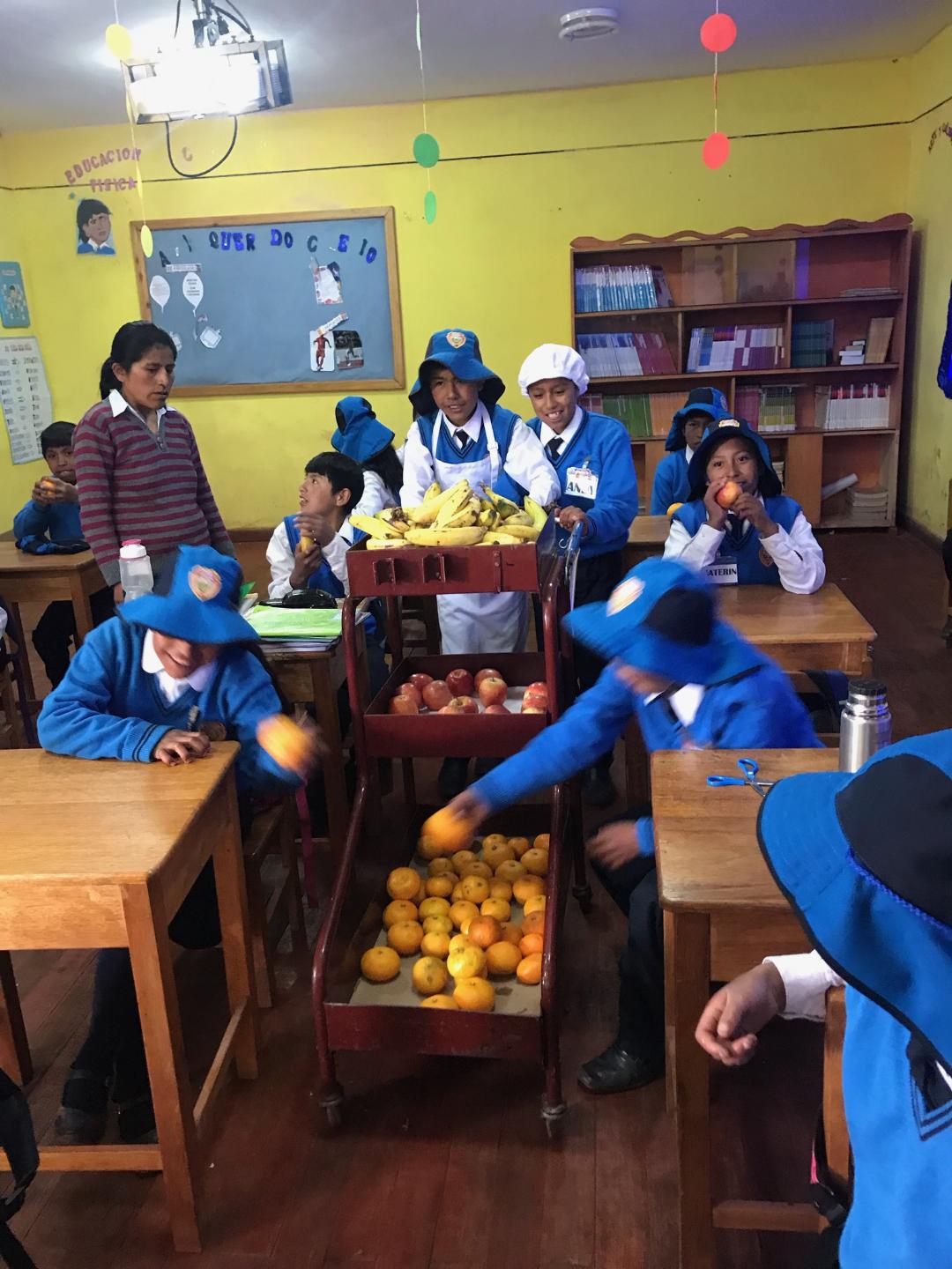 At the high school we provide uniforms each year and fresh fruit each day, which supplements their steady diet of potatoes.