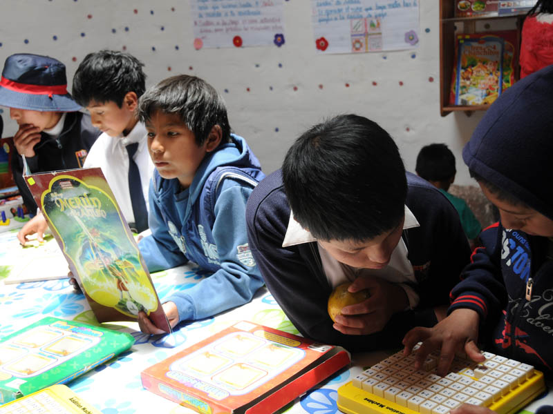 Parents made a library from earth filled plastic bottles